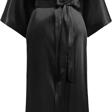 Women wearing long satin kimono robe with silky finish and tie waist in caramel color