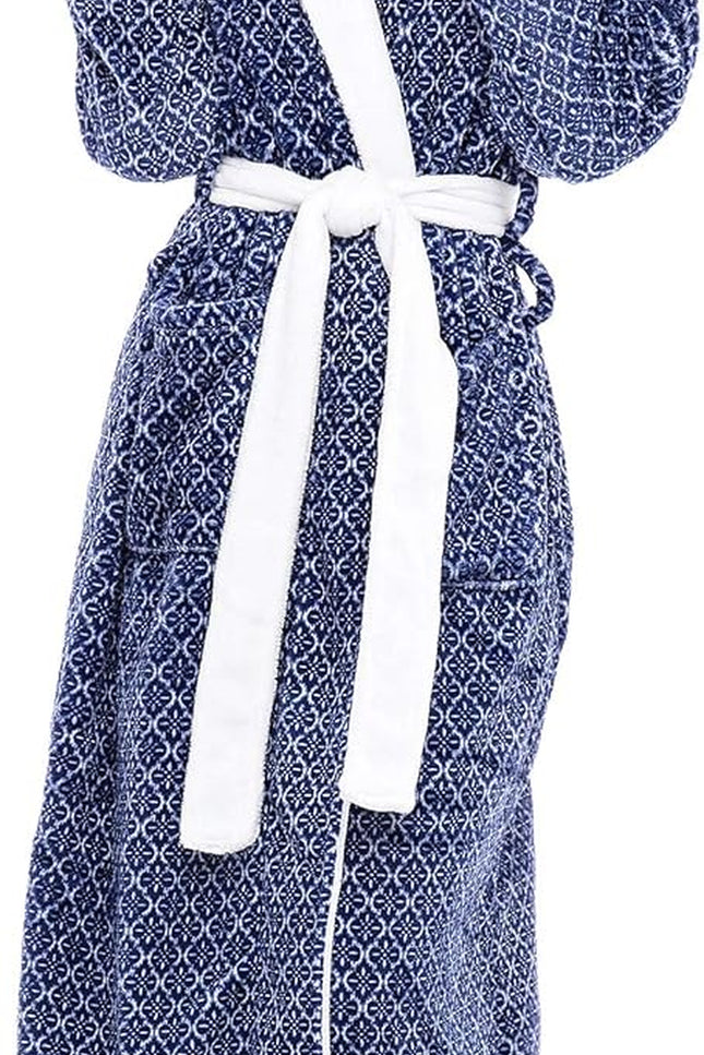 Women wearing full length fleece hooded bath robe for winter lounging
